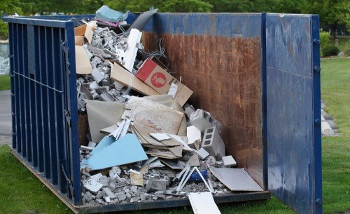Builders removing construction waste in Southwark